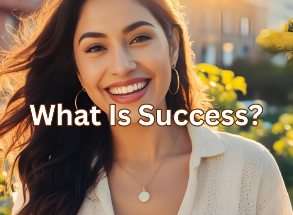 What is Success A woman smiling with the sunshine in the background